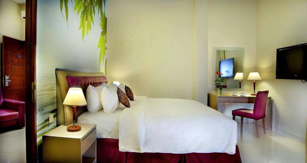 Kuta Central Park Hotel Habitación foto